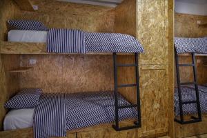 Postel nebo postele na pokoji v ubytování Buff Hostel Tirana