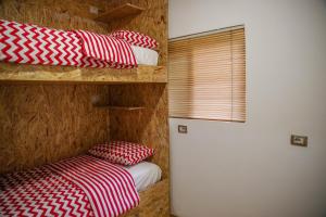 Postel nebo postele na pokoji v ubytování Buff Hostel Tirana