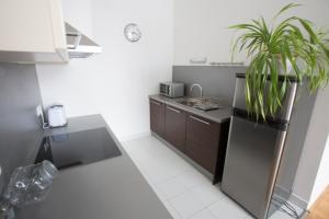 A kitchen or kitchenette at The Old Mill Budapest