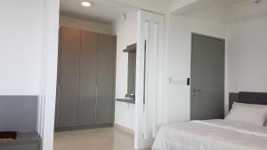 Ένα ή περισσότερα κρεβάτια σε δωμάτιο στο EVO SOHO DUPLEX Suites +11 φωτογραφίες