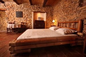 Katil atau katil-katil dalam bilik di Mas d'Alphonse