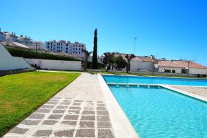 The swimming pool at or close to The Moon Studio by Hello Homes Sitges