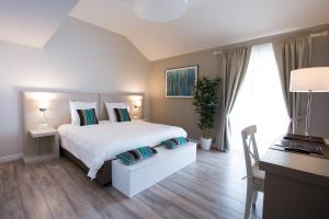 Cama o camas de una habitación en Auberge des Grands Bois