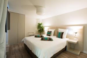 Cama o camas de una habitación en Auberge des Grands Bois