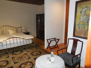 Ein Bett oder Betten in einem Zimmer der Unterkunft Villa Romantica