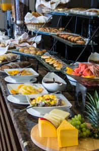 a buffet with many plates of food on a table at Myan Al Urubah Hotel in Riyadh