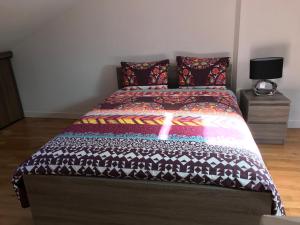 En eller flere senge i et værelse på Appartement Rue Victor Hugo - Port de la Houle