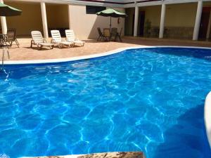 Bazén v ubytování Hotel Plaza Maria nebo v jeho okolí