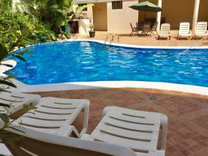 Bazén v ubytování Hotel Plaza Maria nebo v jeho okolí