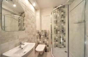 Kúpeľňa v ubytovaní Apartamenty "MILENA"