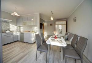 Kuchyňa alebo kuchynka v ubytovaní Apartamenty "MILENA"