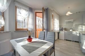 Kuchyňa alebo kuchynka v ubytovaní Apartamenty "MILENA"
