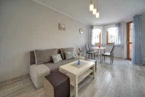 Posedenie v ubytovaní Apartamenty "MILENA"