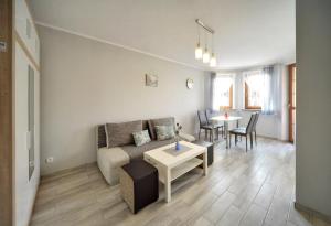 Posedenie v ubytovaní Apartamenty "MILENA"