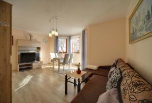 Posedenie v ubytovaní Apartamenty "MILENA"