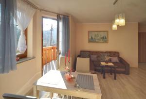 Posedenie v ubytovaní Apartamenty "MILENA"