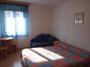 Posteľ alebo postele v izbe v ubytovaní Apartments Marko Novigrad