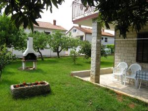 Vonkajšia záhrada v ubytovaní Apartments Marko Novigrad