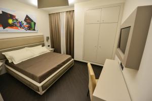 Petit Hotel Elita客房内的一张或多张床位