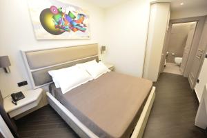 Petit Hotel Elita客房内的一张或多张床位