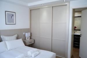 Posteľ alebo postele v izbe v ubytovaní Bungalow ACK