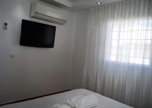 Posteľ alebo postele v izbe v ubytovaní Bungalow ACK