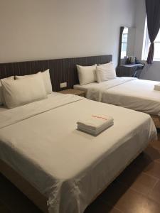 Cama o camas de una habitación en Hotel Intan Jugra