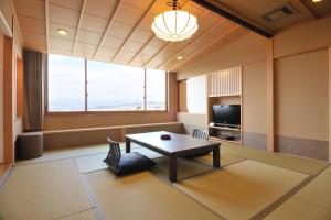 TV a/nebo společenská místnost v ubytování Hotel New Kotobuki