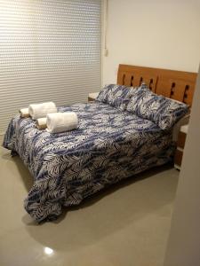 Ліжко або ліжка в номері Altara