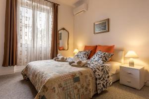 Posteľ alebo postele v izbe v ubytovaní Apartment KAPO