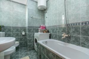Kúpeľňa v ubytovaní Apartment KAPO + 37 fotografií