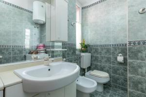 Kúpeľňa v ubytovaní Apartment KAPO