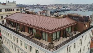 
a building that has a lot of windows on top of it at The Galata Istanbul Hotel MGallery in Istanbul
