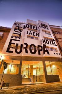 a building with a sign on the side of it at Hotel Europa in Jaén