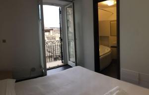 Voodi või voodid majutusasutuse La Scala Suite toas