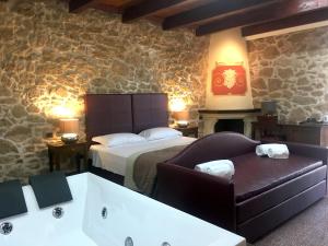 Postel nebo postele na pokoji v ubytování Bienestar - Maison de Charme
