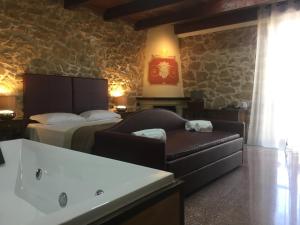 Postel nebo postele na pokoji v ubytování Bienestar - Maison de Charme
