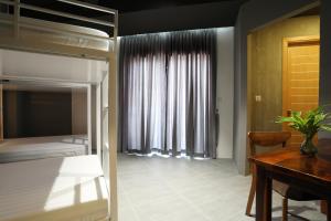 Letto o letti in una camera di RS II Guesthouse