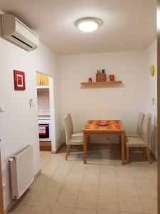 A kitchen or kitchenette at Mészáros apartman