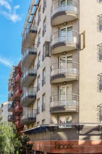 an apartment building with balconies on the side of it at Adagio Nice Centre in Nice