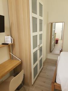 Postel nebo postele na pokoji v ubytování Residence Campo Rotondo
