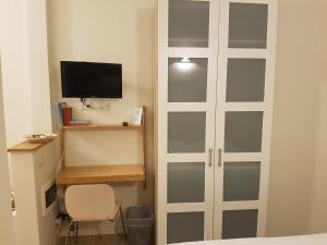 TV a/nebo společenská místnost v ubytování Residence Campo Rotondo