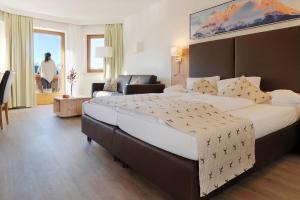 A bed or beds in a room at Hotel Venetblick