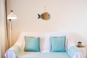 A bed or beds in a room at Villa Brezza Marina