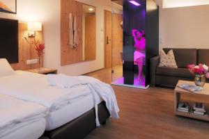 A bed or beds in a room at Hotel Venetblick