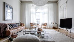 TV a/nebo společenská místnost v ubytování Nobis Hotel Stockholm, a Member of Design Hotels™