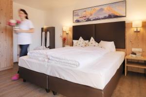 A bed or beds in a room at Hotel Venetblick