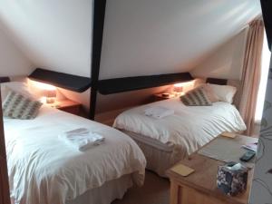 Postel nebo postele na pokoji v ubytování Boulmer Guest House