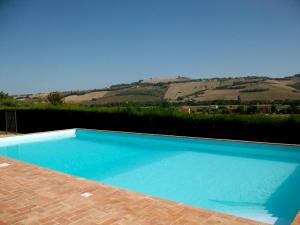 The swimming pool at or close to Il Gallo Del Vicino