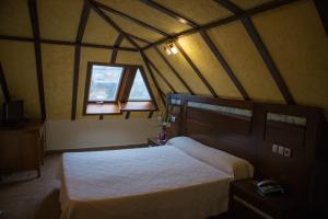 Postel nebo postele na pokoji v ubytování Hotel Casa Beletri